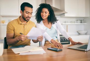 Couple looking at bills