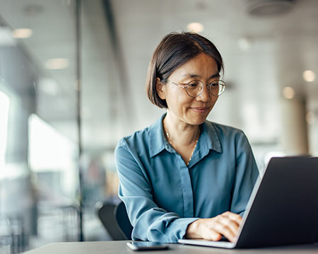Confident asian woman, trying to help her customers